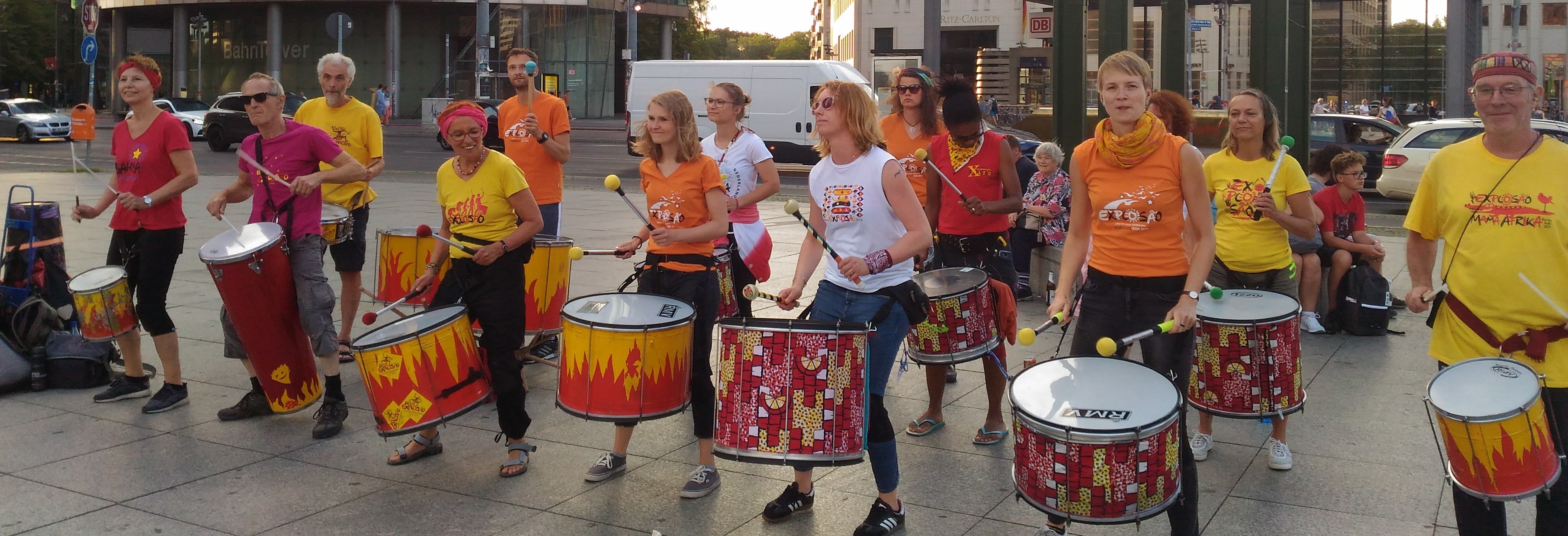 big percussion ensemble performing in the streets